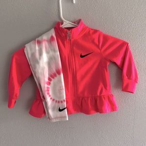 Toddler Nike zip up with athletic leggings.